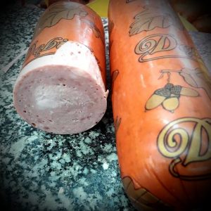 Kiełbasa dębicka ok.100g.plastry (Kom-rol)